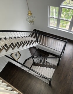 Stair case runner installation from Westbrook Floor Covering in Old Lyme, CT
